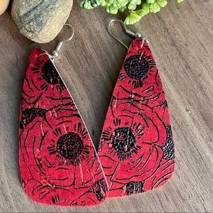 Red leather cork with black floral design